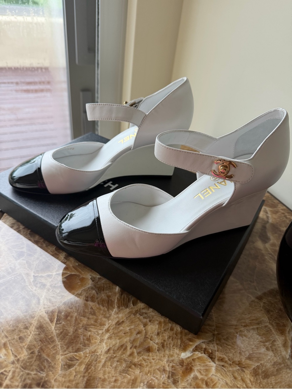 CHANEL Two-Tone Mary Jane Wedge Pumps in White and Black with Gold CC Accent